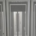 Perforated data centre cabinets at MarQi Cloud Zone1, front doors closed, one labelled "Data Center Cabinet 4".